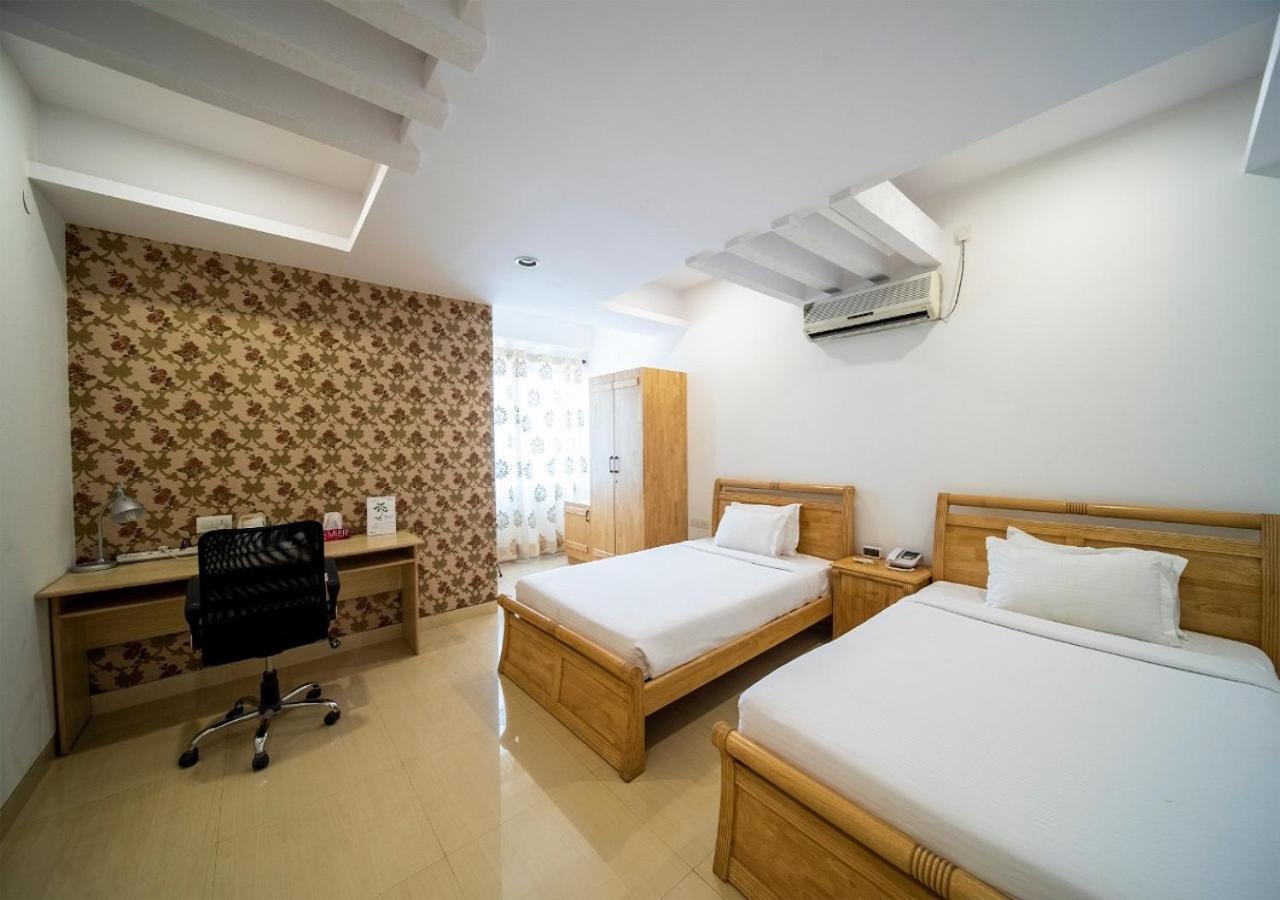 Capital O 46966 Apollo 27 Hotel Bangalore Buitenkant foto