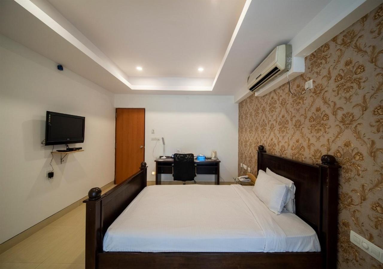 Capital O 46966 Apollo 27 Hotel Bangalore Buitenkant foto